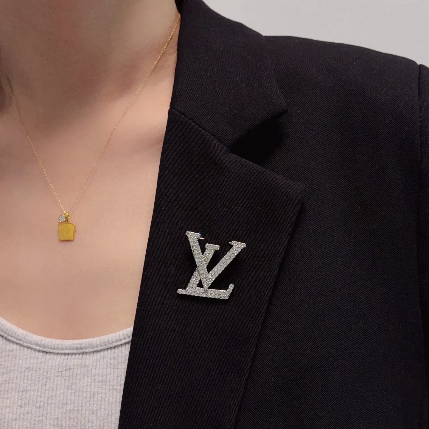 Louis Vuitton Silver Tone 'LV' Logo Brooch